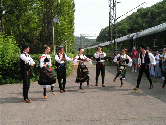 Folklore dancers at the Topcider station, next to the Blue Train